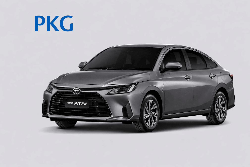รถเช่าญี่ปุ่น Toyota Yaris ATIV สีเทา ภาพรถซีดาน 4 ประตู พร้อมโลโก้ PKG เหมาะสำหรับขับเที่ยวญี่ปุ่น ประหยัดน้ำมัน ขับง่าย เหมาะกับครอบครัวและนักท่องเที่ยว